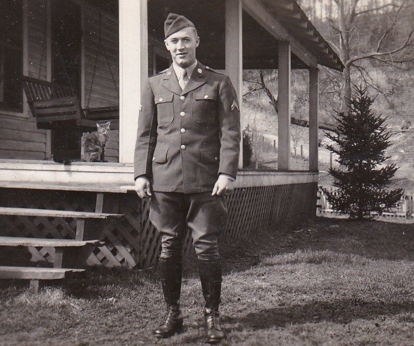 Russell in uniform at home in Lancing